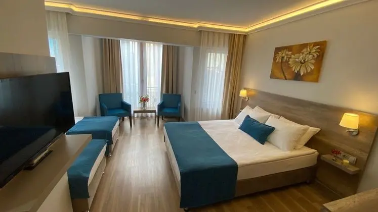 Üç Kisilik