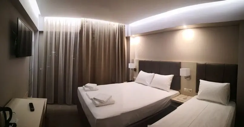 Deluxe Üç Kişilik Oda