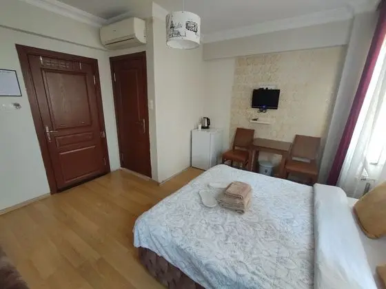 Üç Kişilik Oda