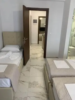 Üç Kişilik Oda