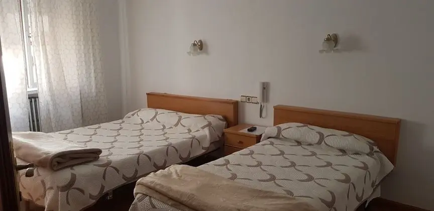 Üç Kişilik Oda