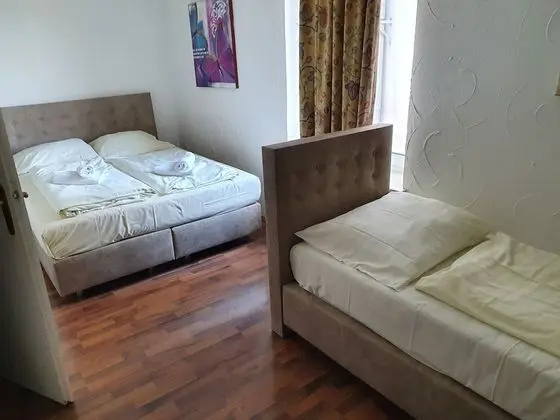 Üç Kişilik Oda