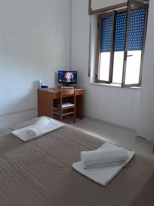 Economy Tek Büyük veya İki Ayrı Yataklı Oda
