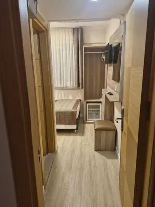 Ekonomik Tek Kişilik Oda, Bahçe veya Sokak Manzaralı, Klimalı