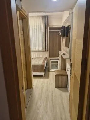 Ekonomik Tek Kişilik Oda, Bahçe veya Sokak Manzaralı, Klimalı