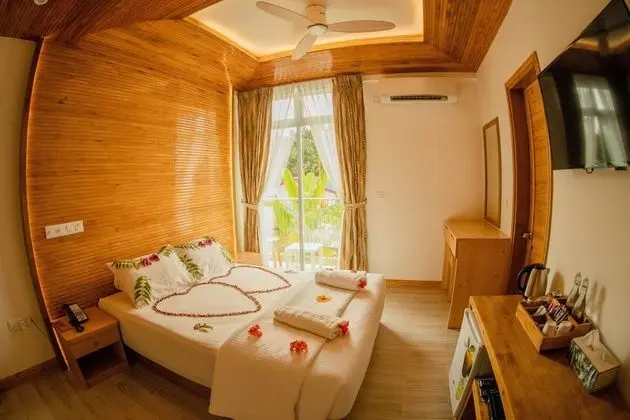 Deluxe Tek Büyük veya İki Ayrı Yataklı Oda