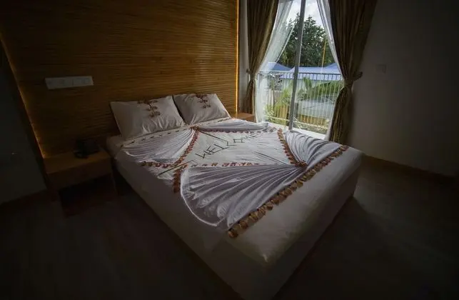 Deluxe Tek Büyük veya İki Ayrı Yataklı Oda