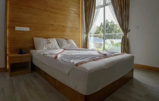 Deluxe Tek Büyük veya İki Ayrı Yataklı Oda