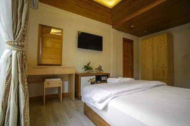 Deluxe Tek Büyük veya İki Ayrı Yataklı Oda