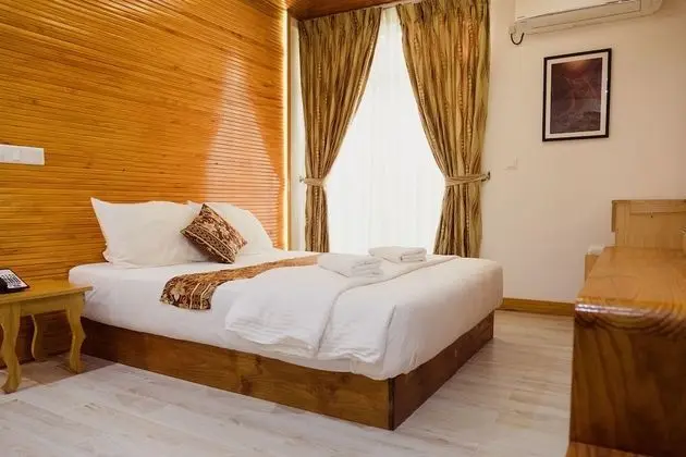 Deluxe Tek Büyük veya İki Ayrı Yataklı Oda