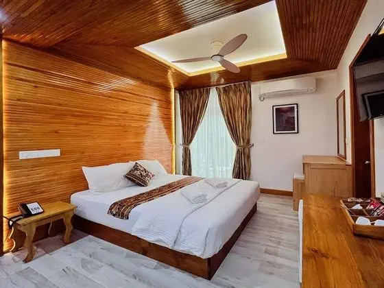 Deluxe Tek Büyük veya İki Ayrı Yataklı Oda