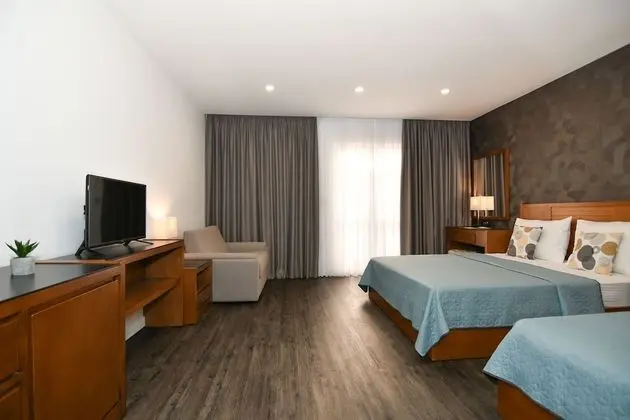 Standard Üç Kişilik Oda, Bahçe Manzaralı