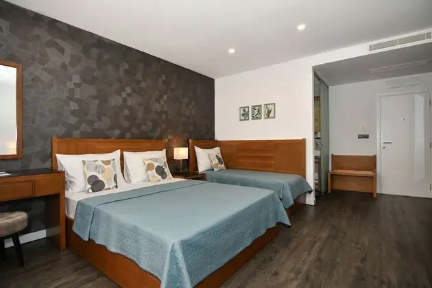 Standard Üç Kişilik Oda, Bahçe Manzaralı