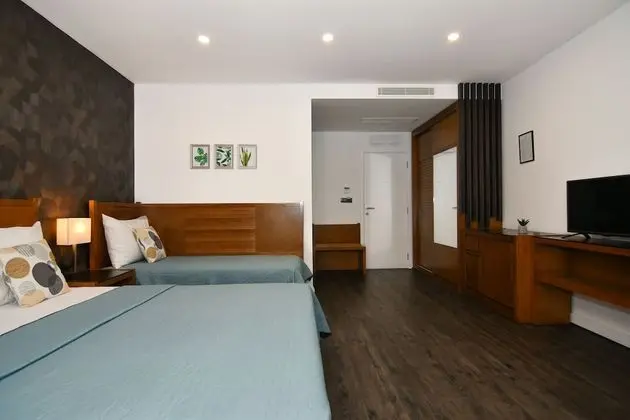 Standard Üç Kişilik Oda, Bahçe Manzaralı