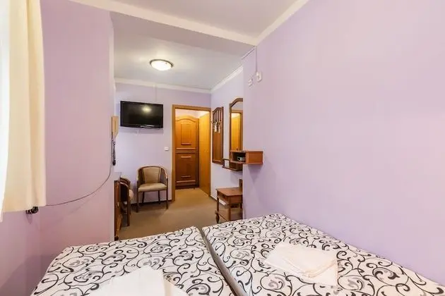 Classic Tek Büyük veya İki Ayrı Yataklı Oda