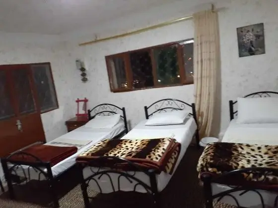 Üç Kişilik Oda