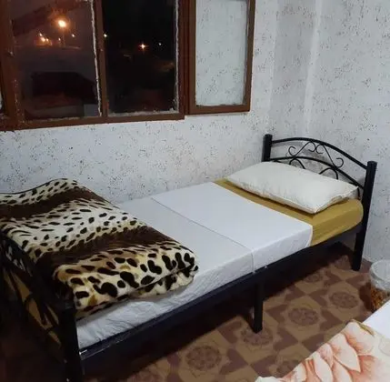 Üç Kişilik Oda