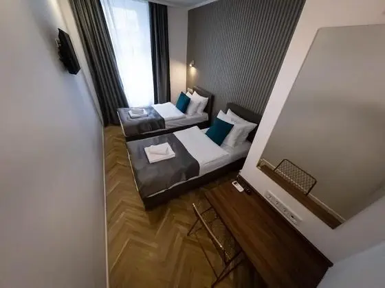 Deluxe Tek Büyük veya İki Ayrı Yataklı Oda