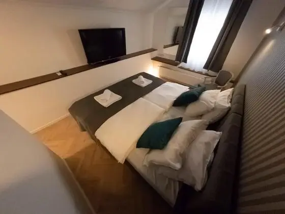 Deluxe Tek Büyük veya İki Ayrı Yataklı Oda