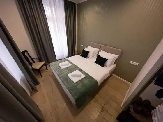 Deluxe Tek Büyük veya İki Ayrı Yataklı Oda
