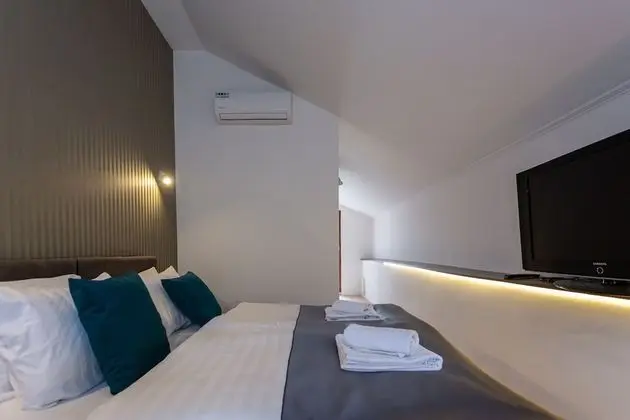 Deluxe Tek Büyük veya İki Ayrı Yataklı Oda