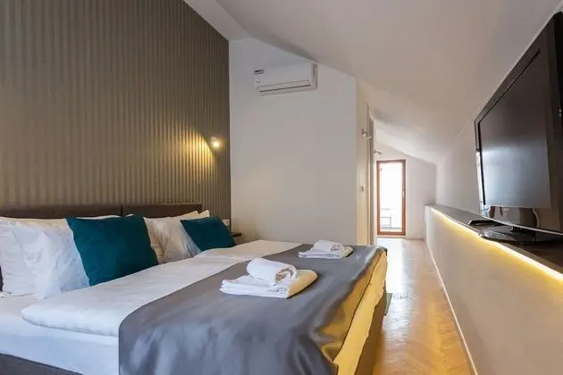 Deluxe Tek Büyük veya İki Ayrı Yataklı Oda