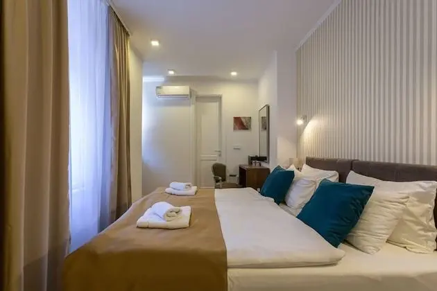 Deluxe Tek Büyük veya İki Ayrı Yataklı Oda
