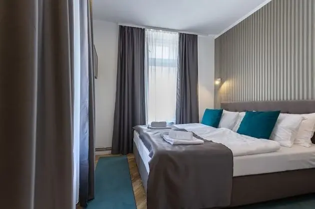 Deluxe Tek Büyük veya İki Ayrı Yataklı Oda