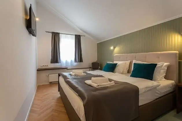 Deluxe Tek Büyük veya İki Ayrı Yataklı Oda