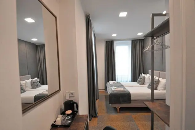 Deluxe Tek Büyük veya İki Ayrı Yataklı Oda