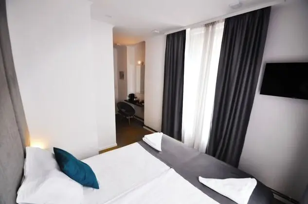 Deluxe Tek Büyük veya İki Ayrı Yataklı Oda
