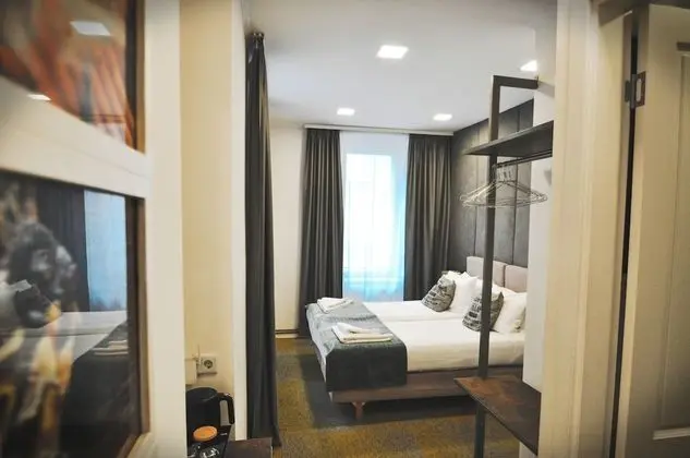 Deluxe Tek Büyük veya İki Ayrı Yataklı Oda