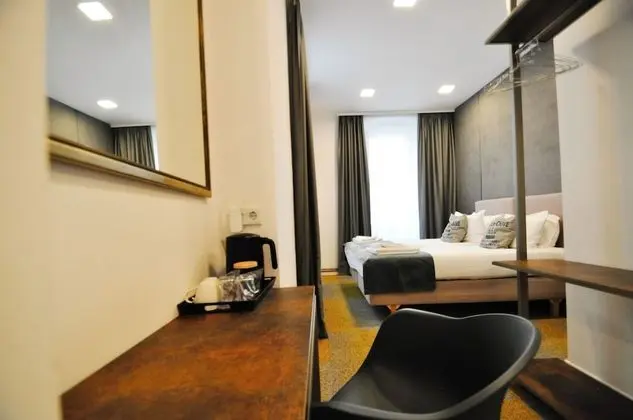 Deluxe Tek Büyük veya İki Ayrı Yataklı Oda