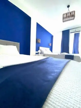Ekonomik Üç Kişilik Oda, Dağ veya Havuz Manzaralı, Balkonlu