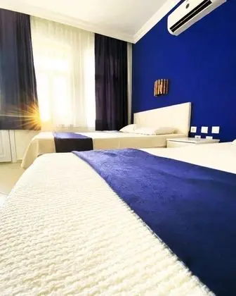 Ekonomik Üç Kişilik Oda, Dağ veya Havuz Manzaralı, Balkonlu