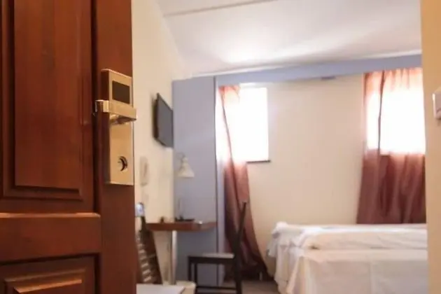 Economy Tek Büyük veya İki Ayrı Yataklı Oda