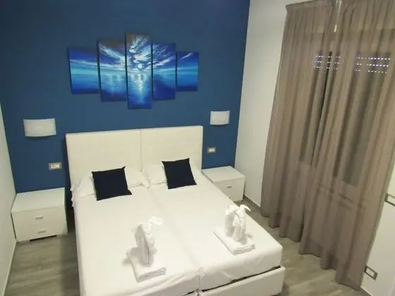 Deluxe Tek Büyük veya İki Ayrı Yataklı Oda