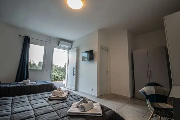 Deluxe Üç Kişilik Oda, Bahçe Manzaralı