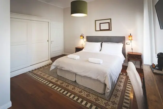 Deluxe Tek Büyük veya İki Ayrı Yataklı Oda