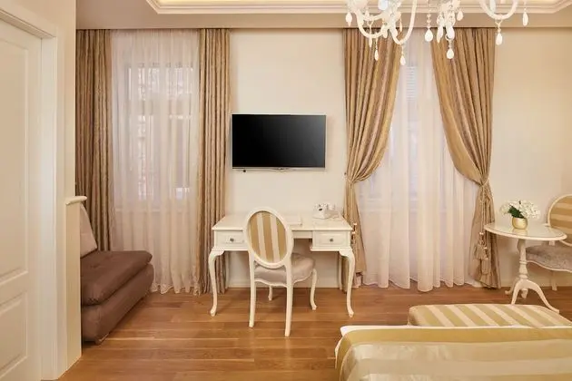 Deluxe Tek Büyük veya İki Ayrı Yataklı Oda