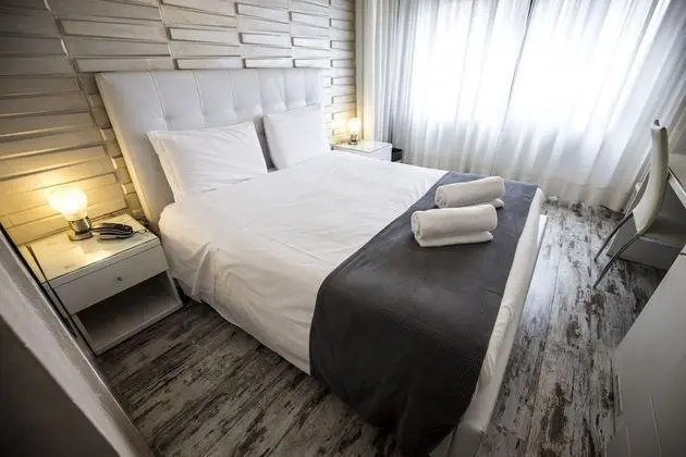 Deluxe Tek Büyük veya İki Ayrı Yataklı Oda