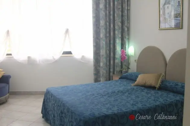 Comfort Tek Büyük veya İki Ayrı Yataklı Oda