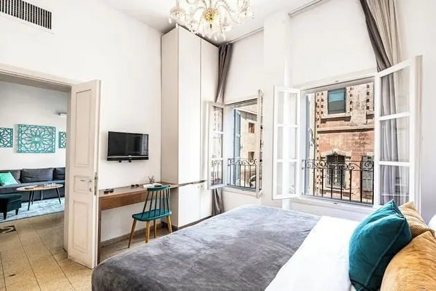 One-Bedroom Apartment with Balcony and City View