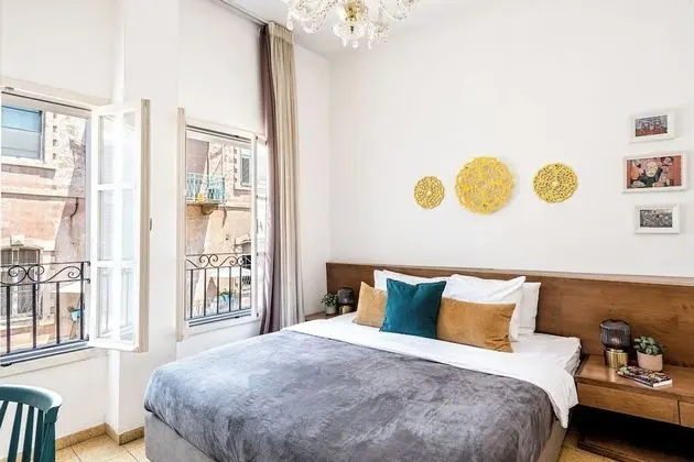 One-Bedroom Apartment with Balcony and City View