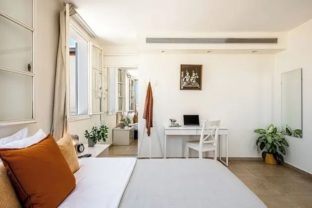 One-Bedroom Apartment with Balcony and City View