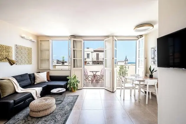 One-Bedroom Apartment with Balcony and City View