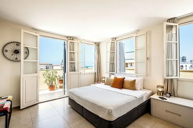 One-Bedroom Apartment with Balcony and City View