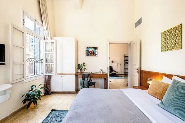 One-Bedroom Apartment with Balcony and City View