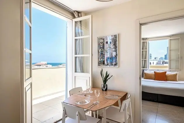 One-Bedroom Apartment with Balcony and City View