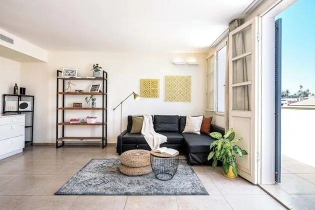 One-Bedroom Apartment with Balcony and City View
